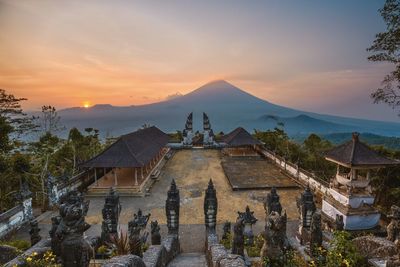 Panoramic view of buildings against sky during sunset