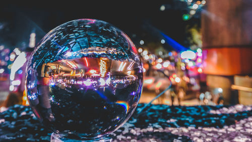 Close-up of illuminated christmas lights at night