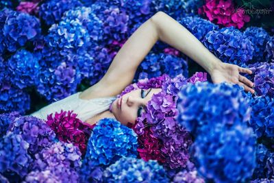 Woman with purple flowers