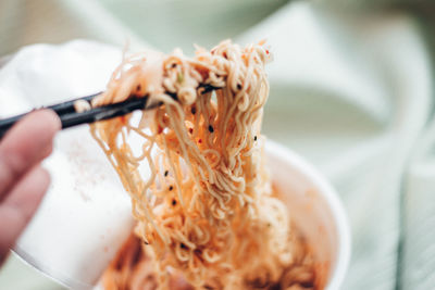 Close-up of person holding ice cream