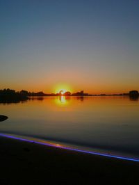 Scenic view of sunset over sea