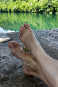 Girl's legs on the mreznica river, croatia