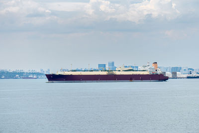 Nautical vessel on sea against sky