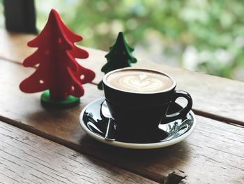 Close-up of cappuccino on table