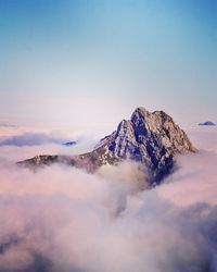 Mountain and cloudscape against sky