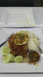 High angle view of food served on table