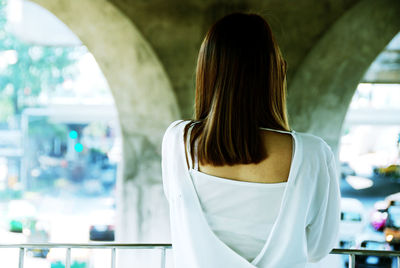 Rear view of woman standing in hair