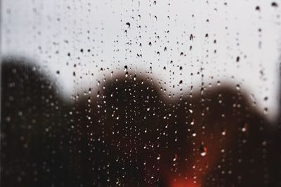 Close-up of wet window in rainy season