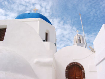 Low angle view of church against sky at santorini