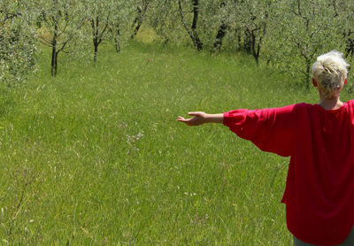 Woman standing on field