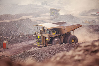 Mining activity, mining dump truck, high angle view of truck working on field