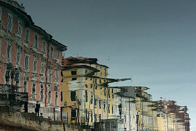 Low angle view of buildings against clear sky