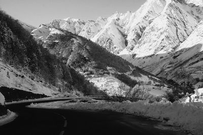 Scenic view of snow covered mountain against sky