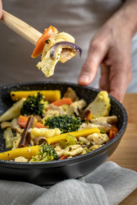 Close-up of person preparing food