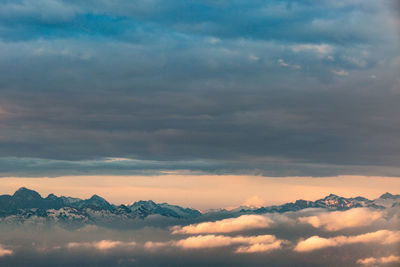 Morning clouds parting ways and the swiss alps temporary came into view - zurich, switzerland