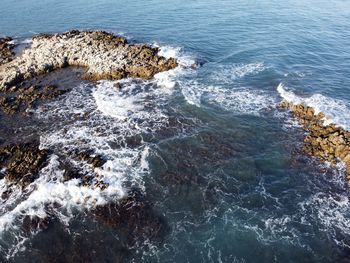 High angle view of rocks on beach