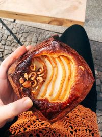 High angle view of person holding bread