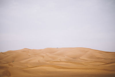 Scenic view of desert against sky