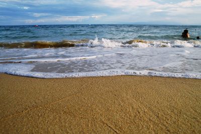 Scenic view of beach against sky