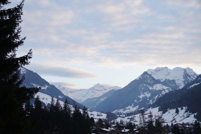 Scenic view of mountains against sky during winter