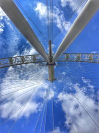 Low angle view of cables against sky