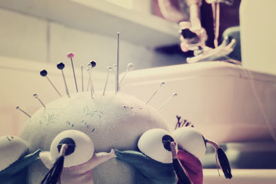 Close-up of art on table at home