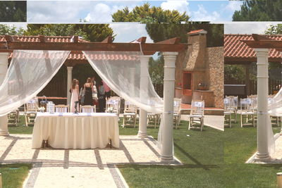 Table and woman standing in yard against built structure