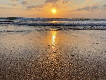 Scenic view of sea against sky during sunset