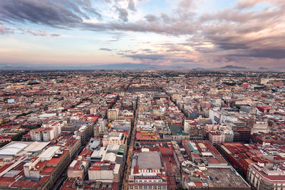 Aerial view of cityscape against sky