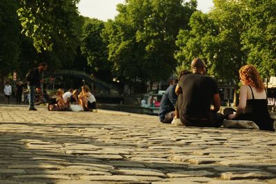 People relaxing in park