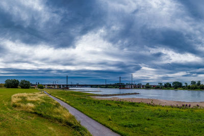 Bridge over river against sky