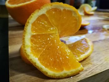 Close-up of orange slices on table