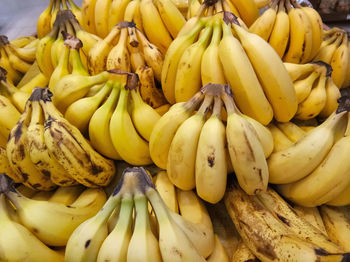 Close-up of yellow fruits for sale at market stall