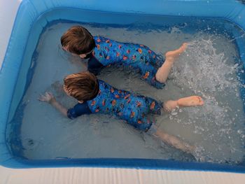 High angle view of bothers wading pool