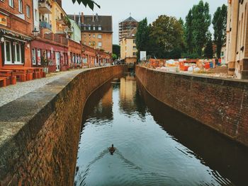 View of canal in city