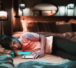 High angle view of people sleeping on bed at home