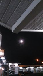 Low angle view of illuminated building at night