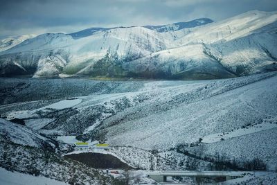 Scenic view of snowcapped mountains during winter