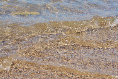 High angle view of waves on beach