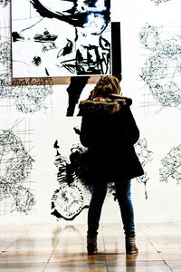 Woman standing against sky