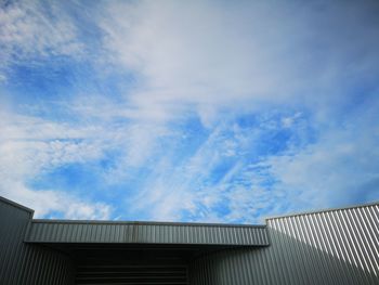 Low angle view of building against blue sky