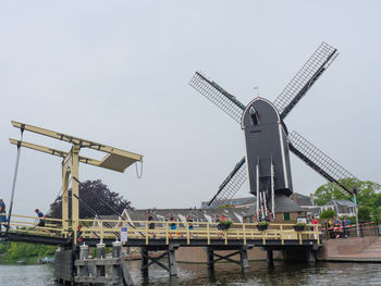 Traditional windmill against clear sky