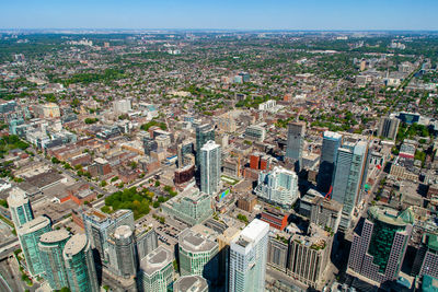 Aerial view of city buildings against sky
