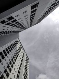 Low angle view of modern buildings against sky