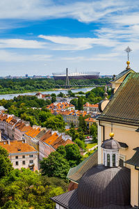 High angle view of trees and buildings against sky