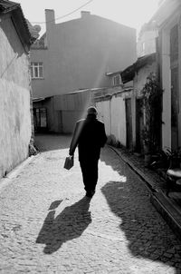 Woman walking on city street