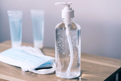 Close-up of water bottle on table