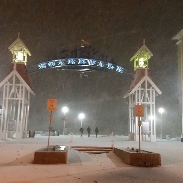 built structure, architecture, illuminated, text, lighting equipment, guidance, street light, communication, building exterior, western script, the way forward, empty, information sign, street, road sign, night, sign, road, no people, outdoors