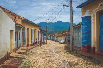 Alley amidst buildings in city