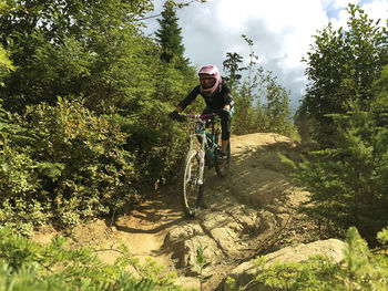 Man riding bicycle in park